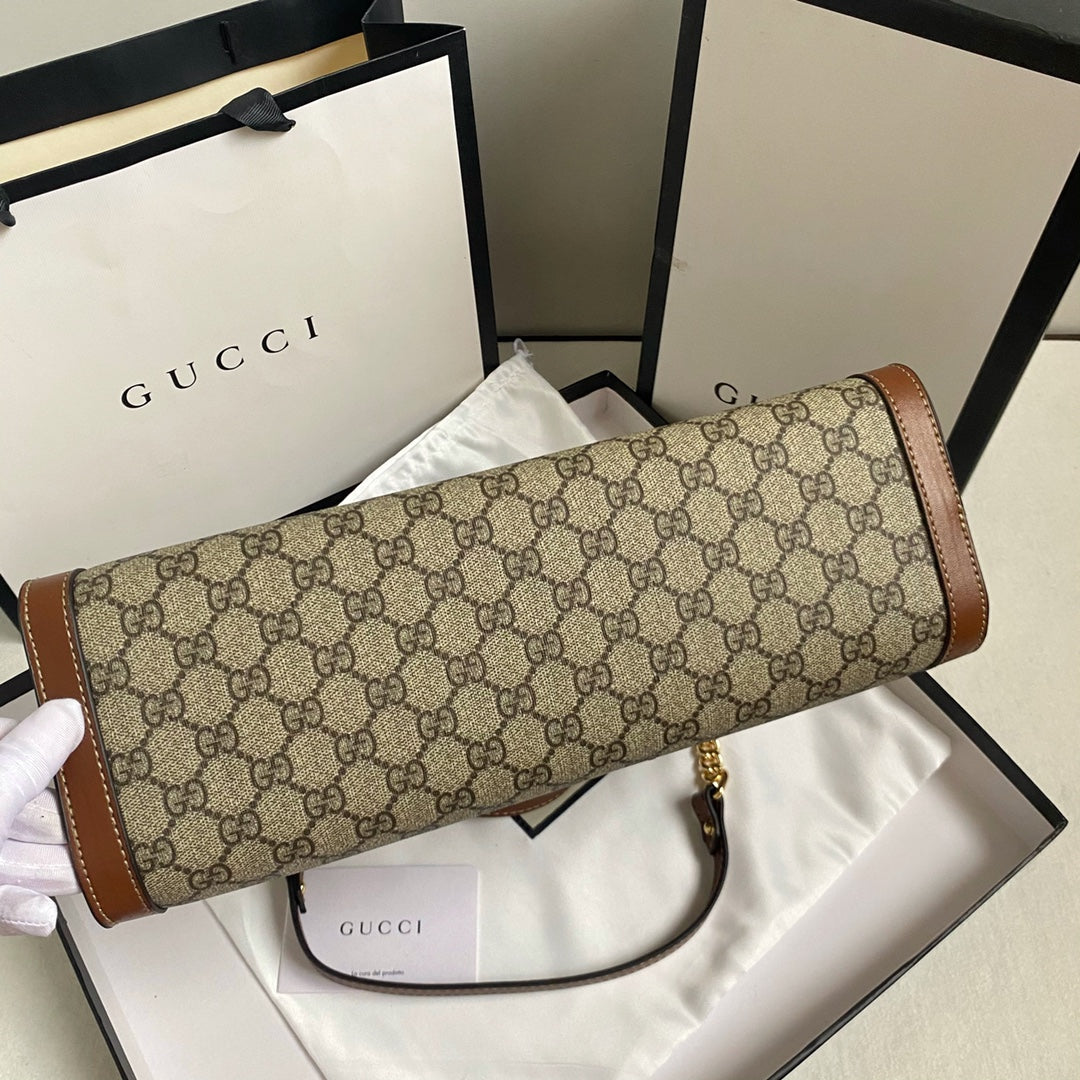 Lockable double strap shoulder bag